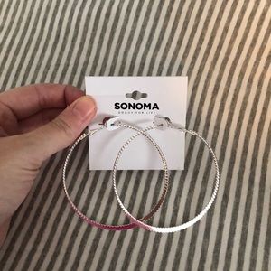 Large silver hoop earrings